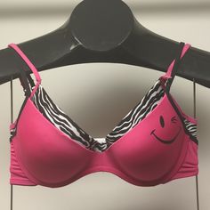 This Set Of Two Joe Boxer 34c Push-Up Bras Combines Comfort And Support With A Flattering Lift. Each Bra Features Underwire Support, Plunge Neckline, Convertible Straps That Can Be Worn Regularly Or As A Racerback, And Back Adjustable Spaghetti Straps And Back Hook-And-Eye Closures. Designed To Add Approximately One Cup Size To Enhance Your Silhouette, These Bras Offer A Perfect Fit And Style For Any Outfit. Though The Upc Tags Are Missing, These Bras Are Brand New And Still Have A Plunge Tag At Pink Swimwear With Medium Bust Support For Summer, Low-cut Padded Pink Bra, Pink Low-cut Padded Bra, Pink Padded Underwire Bra, Pink Push-up Bra With Built-in Support, Low-cut Pink Bra With Removable Pads, Pink Low-cut Bra With Removable Pads, Low-cut Pink Bra With Lined Body, Low-cut Lined Pink Bra