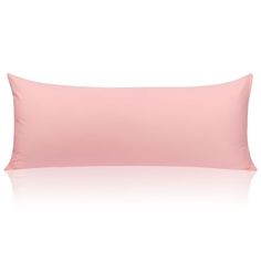 a pink pillow on a white background