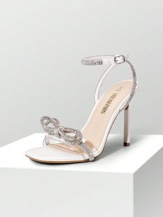 Wedding Shoes With Embellished Ankle Strap, Embellished Wedding Shoes With Ankle Strap For Parties, Embellished Open Toe Wedding Shoes For Party, Elegant Sandals For Wedding And Party Season, Glamorous Wedding Shoes With Bow, Glamorous White Party Sandals, Square Toe Shoes, Crystal Heels, Crystal Sandals