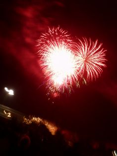 fireworks are lit up in the night sky