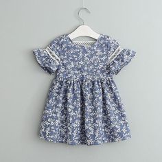 Floral Dress for Toddler Girl - PrettyKid Short Sleeve Cotton Dress For Dress-up, Casual Sundress For Summer Dress-up, Light Blue Cotton Sundress For Spring, Summer Floral Print Dress For Dress-up, Floral Print Dress For Summer Dress-up, Cute Cotton Floral Dress For Spring, Cotton Short Sleeve Sundress For Spring, Cotton Dress For Summer Dress-up, Cotton Summer Dress For Dress-up Occasions