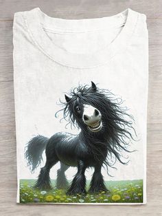 a white t - shirt with a black horse on it's chest and long hair blowing in the wind