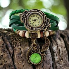 "Womens watch leather bracelet vintage watch style boho bracelet gift for her bohemian jewelry steampunk watch sister gift nature jewelry leaf charm. Very elegant gift for her, gift for mum, sister gift, girlfriend gift, best friend gift!  Having a dear friend or family, whose birthday is approaching? Anniversary? Tank you gift? Looking for a great Christmas gift?  This unique, beautiful watch will make someone very happy for whatever the occasion. Comes in an elegant watch box. Strap has got several positions and will fit every wrist. Measurements and characteristics: Dial colour: vintage bronze Dial diameter:1.5cm Case Diameter:2.5cm Band length: 22-23 cm Band to fit a wrist with length:16.5-21cm Band width: 1.8cm Materials: Bronze Brass Leather Green watch picture is an example of what Boho Watch, Green Watch, Steampunk Watch, Watches Women Leather, Leaf Jewelry, Watch Gifts, Women Wrist Watch, Beautiful Watches, Nature Jewelry