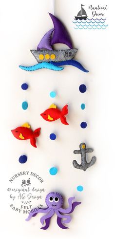 an octopus, pirate ship and other sea creatures made out of fondant on a white background