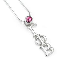 Stunning sterling silver silver Gamma Phi Beta pendant with the Greek letters set with a genuine Swarovski™ pink crystal and created exclusively by our company. Finished with rhodium for a brilliant, lasting shine. This is a perfect gift for your big or little, or even yourself! Also, the sterling silver snake chain shown the picture is for sale as well for only an additional $9. Available in 16, 18, and 20 inches. If you would like to add a chain, please select the style or no chain in the drop Pink Sorority, Sorority Jewelry, Gamma Phi Beta, Gamma Phi, Greek Letters, Silver Snake Chain, Letter Set, Pink Crystal, Snake Chain