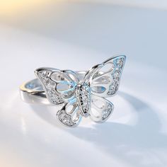 Add a silver-plated gleam to daily ensembles with this butterfly ring hosting a selection of glittering cubic zirconias. Face : 0.53" H Silver-plated copper / cubic zirconia Green Yellow Blue, Stylish Rings, Butterfly Ring, Men's Jewelry Rings, Stylish Jewelry, Valentin Nap, Lab Created Diamonds, Womens Engagement Rings, San Valentino