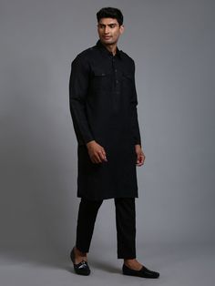 Vastramay Men's Black Pathani Suit Set Make a statement with this classic black Pathani suit set from Vastramay. Crafted from premium fabric, this suit features a comfortable fit and stylish design, perfect for special occasions and festivities. Features: Classic black color Comfortable fit Stylish design Specifications: Brand: Vastramay Color: Black Material: Premium fabric Sleeve Length: Full sleeves Material & Care: 100% Premium fabric. Dry clean only. Legal Disclaimer: The product is guarant Festive Cotton Suits For Formal Occasions, Festive Formal Cotton Suits, Festive Cotton Formal Suits, Traditional Long Sleeve Business Sets, Traditional Black Cotton Bandhgala, Tailored Black Sets With Long Sleeves, Black Tailored Long Sleeve Sets, Tailored Black Long Sleeve Sets, Traditional Black Long Sleeve Suits