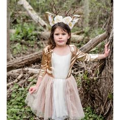 "If a deer is your spirit animal? This adorable deer costume is perfect for everyday play or Halloween. The dress has a full skirt featuring gold glitter, an ombre effect on the layers of tulle, ¾ length sleeve, and a v-neck collar. The skirt is lined so it doesn't scratch or itch. The white tulle ruffle around the neckline and the tail on the back of the skirt add to the deer effect! Complete the look with a headband featuring ears, antlers, roses, and green leaves. Sizing: - My size 5-6 is des Deer Costume For Kids, Knight Costume For Kids, Fawn Costume, Old Halloween Costumes, Dino Costume, Deer Dress, Deer Costume, Woodland Deer, Your Spirit Animal