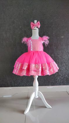 Celebrate your little one's special day in style with our Luxury Pink Sequin Mini Dress! This stunning birthday outfit is adorned with customizable crystals, adding a touch of glamour to any celebration. Perfect for birthday parties, photoshoots, or any special occasion, this hot pink romper tutu is designed to make your child feel like a princess. Features: Handcrafted with attention to detail for a luxurious look. Customizable crystal embellishments to add a personal touch. Sparkling pink sequins that catch the light and make your little one shine. Versatile design suitable for birthday parties, photoshoots, or any festive event. Comfortable and easy to wear for hours of joyful celebration. Make your child's birthday memorable with this exquisite birthday tutu dress. Order now to ensure Pink Pageant Dress For Party Season, Pink Sequin Dress For Pageant Party Season, Pink Sequin Tulle Dress For Party, Princess Embellished Tutu Dress For Party, Princess Style Embellished Tutu Dress For Party, Pink Dress For Pageant Party Season, Pink Sequined Tutu Dress For Birthday, Pink Princess Pageant Party Dress, Pink Princess Pageant Dress For Party