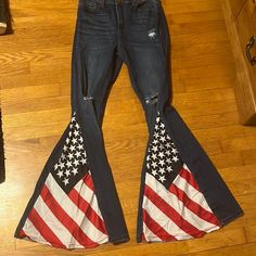 Brand New! Cool America Pants Hand Made By Trails Clothing! Very Cute Never Worn! Big Bell Bottom Flare! A Little Big On My Liking But Are Super Cute Patriotic American Flag Print Bottoms, Blue Patriotic Bottoms For 4th Of July, Patriotic American Flag Print Blue Bottoms, Patriotic Blue Bottoms For 4th Of July, Casual High Waist Bottoms With American Flag Print, Casual High-waist Bottoms With American Flag Print, Trendy American Flag Print Bottoms For 4th Of July, Trendy Cotton Jeans For 4th Of July, Trendy High Waist Bottoms For 4th Of July