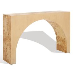 an arch shaped wooden bench made out of plywood and wood veneers on the top