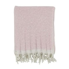 a pink and white blanket with fringes