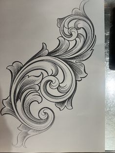 a drawing of an ornate design on paper