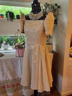 Modern Filipiniana Susana dress (SA-SU-001).  Beige color. Made in the Philippines. This gorgeous piece is perfect for citizenship, multicultural, weddings or any events.  Please check sizing chart provided before placing order. #GawangPinas #SarilingAtin #promotingfilipinoculture Modern Filipiniana Dress Kultura, Modern Filipiniana Dress, Modern Filipiniana, Filipiniana Dress, Silk Organza, Women's Costumes, The Philippines, Sizing Chart, Beige Color