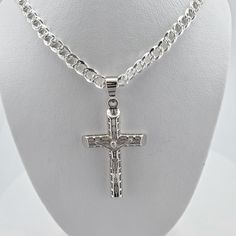 "Solid 925 Sterling Silver Curb Cuban Link Chain WITH Cross, Crucifix pendant, in all lengths 20\",22\",24\",26\" and sizes, men's chain, pendant, gift for him and stamped 925 for authenticity. Crucifix Length: ~3.8cm We proudly stand behind the quality of our products and prioritize your satisfaction above all else. If, for any reason, you are not completely satisfied with your purchase, we offer hassle-free returns with full refunds of the purchase price. Your happiness is our top priority, an White Gold Crucifix Necklace With Silver Chain, Silver Figaro Chain Necklace With Cross Pendant, Silver Necklace With Figaro Chain And Cross Pendant, Silver Cross Necklace With Figaro Chain, Silver Cross Necklace With Figaro Chain As Gift, Silver Crucifix Figaro Chain Jewelry, Silver Crucifix Necklace With Figaro Chain, Silver Cross Curb Chain Necklace, Silver Curb Chain Necklace With Cross Pendant