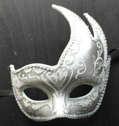 Silver Formal Masquerade Mask For Carnival, Elegant White Masquerade Mask For Carnival, Elegant White Masquerade Mask For Mardi Gras, White Masks For Carnival Party, White Party Masks For Carnival, White Carnival Party Mask, White Carnival Party Masks, White Eye Mask For Masquerade, White Formal Masquerade Mask For Carnival