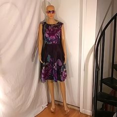 Nwot Tahari Sleeveless Purple A-Line Floral Print Semi Sheer Lined Dress Size 6. This Stunning Classic & Uniquely Designed Dress Features A Semi Sheer Purple Multi Color Floral Print With A Built In Purple Lining That Separates Below The Waist Giving A Silhouette Appearance And Special Visual Affect. A Beautiful Dress For Those Special Occasions. Purple Sleeveless Midi Dress For Spring, Fitted Purple Sleeveless Dress For Spring, Purple Sleeveless Mini Dress For Spring, Purple A-line Sleeveless Dress For Spring, Purple Line, Tahari Dress, Beautiful Dress, Floral Print Dress, Blue Purple