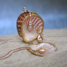 "By ancient lore, pearls were thought to be the tears of gods and goddesses. They were historically symbols of faith and purity, enhancing personal integrity. Pearls help clear the mind so it may be a better channel for wisdom and spiritual guidance. This sweet pink luster pearl is set with the warmth and rosy hue of 14k rose gold to match perfectly. Suspended on a 16\" rose gold filled cable chain. Pearl is June's Birthstone and would make an excellent gift for most any occasion: bridal gift, a Heirloom Pearl Jewelry For Gifts, Rose Gold Pearl Drop Jewelry Gift, Rose Gold High Luster Jewelry For Gift, Heirloom Akoya Pearl Jewelry For Gifts, Rose Gold Akoya Pearl Pendant Jewelry, Teardrop Akoya Pearl Jewelry Gift, Teardrop Akoya Pearl Jewelry For Gifts, Akoya Pearl Teardrop Jewelry For Gift, Pink Gold Pearl Jewelry Gift