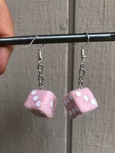 "Item available is a nice new set of 5/8\" lightweight cube pink fuzzy dice earrings. Choose dot (pip) color. Each earring cube measures approx .63 x .63 .63 inches and weighs about 1.3 grams. Chain on each earring is approx 1/2 inch long. I can make custom lengths for you if you like. Hypoallergenic silver or gold plated hooks come with clear silicon earring back stoppers. Hand assembled with pride in U.S.A. Made to order item. Thanks and good luck on this one!" Kitsch Photoshoot, Pink Fuzzy Dice, Thrift Flip Ideas, Fuzzy Dice, Dice Earrings, Flip Ideas, Retro Earrings, Mini Pink, Thrift Flip