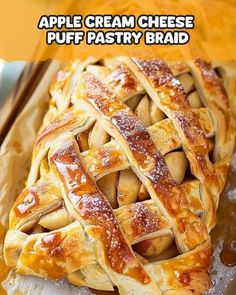 an apple cream cheese puff pastry braid is shown