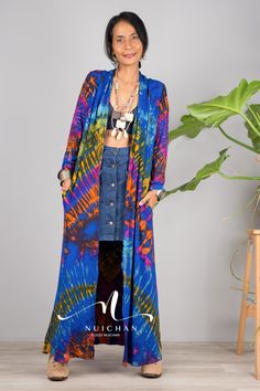 "Tie Dye Cardigan Kimono, Hippie Duster Vest with pockets, Festival Wrap Cape, Beach cover up PRODUCT SIZE : One Size Fits Most These are the exact measurements from the dress, measured whilst laying flat >> * Chest : 32\" up to 40\" * Shoulder to Shoulder : 14 \" * Sleeve length from shoulder to hem : 21\" * Armhole : 16\" * Length : 48\" ( from shoulder to hem) NOTE : * Model chest : 32\", waist : 24\" hips : 35\" * Combined Height is 5\"6 > I'm 5\"2 (158cm) and I'm wearing 4\" heels in the pi Long Hippie Summer Outerwear, Hippie Long Summer Outerwear, Casual Fall Robe, Oversized Bohemian Cardigan With Pockets, Bohemian Oversized Cardigan With Pockets, Bohemian Long Outerwear With Relaxed Fit, Bohemian Long Relaxed Fit Outerwear, Long Bohemian Robe With Relaxed Fit, Bohemian Long Sleeve Relaxed Fit Cover-up