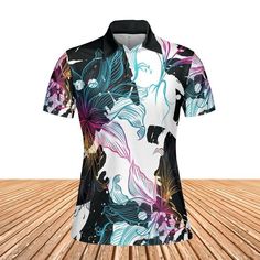 Abstract Gradient Flowers Women's Polo Shirt. If you love abstract designs and gradient colors then this Abstract Gradient Flowers Women's Polo Shirt design is perfect for you! Features a design consisting of an abstract black and white background with rainbow gradient flowers on top. If you love unique creations then this is the perfect polo shirt for you. Classy yet very comfortable to wear; this polo shirt is perfect to keep you cool and dry all day. Product Details Step out with an instant c Black Casual T-shirt With Abstract Print, Casual Multicolor Tops With Abstract Pattern, Casual Multicolor Digital Print Shirt, Casual Multicolor Shirt With Digital Print, Artistic Printed Black Top, Artistic Black Printed Top, Casual White Shirt With Digital Print, Multicolor Digital Print Sublimation Short Sleeve, Casual Black Sublimation Design With All Over Print