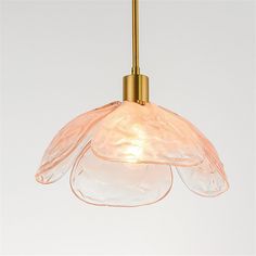 a light that is hanging from a ceiling with a glass shade on the top and bottom