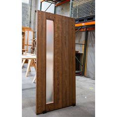 an open wooden door in a warehouse