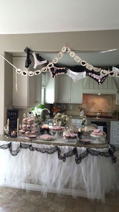 the table is decorated with black and white decorations