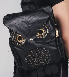 "Get ready to elevate your style with this stunning Owl mini backpack. Made from high-quality black leather, this backpack measures 12 X 9 inches by 4 inches, making it the perfect size for all your essentials. Add a touch of elegance to your wardrobe with this must-have fashion accessory!" School Backpack With Adjustable Strap And Faux Leather, School Backpack With Adjustable Straps In Faux Leather, Faux Leather Backpack With Adjustable Strap, Black Faux Leather Rectangular Backpack, Black Rectangular Faux Leather Backpack, Black Faux Leather Backpack For School, Trendy School Backpack With Leather Backing, Black Faux Leather School Backpack, Luxury Black Backpack For School