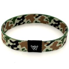 "Get lost in the desert with our Desert Camo band.  Available sizes:  Extra Small 5.5\" (petites + kids) Small 6.5\" (most common fitting size) Medium 7.5\" (large wrists) Large or Anklet 8.5\" (very large wrists or anklet) 3/8\" Width Reversible surf, music and beachy prints. Elastic blend material, can stretch to desired fit. Packaged in natural drawstring gift pouches. Machine washable. Chlorine and saltwater safe." Casual Multicolor Wristband, Casual Everyday Wristband With Bracelet Style, Casual Black Wristband, Adjustable Band Bracelet Casual Style, Adjustable Casual Band Bracelet, Adjustable Casual Wristband, Casual Black Band Wristband Bracelet, Casual Black Wristband Bracelet, Adjustable Band Bracelet