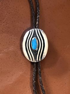 Turquoise Sterling Silver Bolo Tie Southwest RF871 - Etsy Western Style Engraved Blue Jewelry, Adjustable Hand Tooled Blue Jewelry, Blue Adjustable Hand Tooled Jewelry, Southwestern Blue Bolo Ties As A Gift, Southwestern Blue Bolo Tie For Gift, Artisan Turquoise Bolo Ties With Concho, Handmade Artisan Turquoise Bolo Ties, Artisan Handmade Turquoise Bolo Ties, Blue Concho Jewelry For Western-themed Events