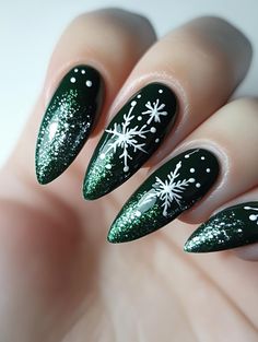 Embrace the magic of green Christmas nails with 20 stunning designs for your festive look. From subtle sage gradients to bold evergreen glitter, these manicures capture the spirit of the season. Create miniature winter landscapes, adorn your tips with tiny reindeer, and add a touch of red for classic Christmas charm. Let your fingertips become a canvas for holiday cheer, spreading joy with every hand gesture. Green Almond Nails Christmas, Subtle Christmas Nails Gel, Christmas Nail Designs Acrylic Almond, Xmas Tree Nails, Subtle Winter Nails, Green Christmas Nail Ideas, Christmas Light Nails, Christmas Nails Green, Green Christmas Nail