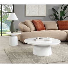 Product Features Include：Coffee Table *1 Color: Engineering Marble & White High Gloss Finish Materials: Metal, Composite Wood, Engineering Marble Catalog Size: 40"Dia x 14"H Assembly Required: Yes Step into a world of serenity with this stunning Zaid collection table set in a pristine white finish These tables blend seamlessly with any decor, creating a tranquil and sophisticated atmosphere Perfect for both modern and classic interiors, the minimalist design offers a clean and airy feel Whether Wood Engineering, White Gloss Coffee Table, Classic Interiors, Acme Furniture, Marble Coffee Table, Faux Marble, Living Room Coffee Table, Classic Interior, Decor Display