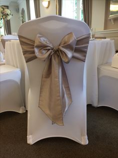 the back of a chair with a bow on it