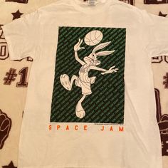 Space Jam T-Shirt Size Medium Juniors *Juniors Sizes Run Smaller* 90s White Graphic Print T-shirt, 90s Style Pre-shrunk White T-shirt, 90s Style White T-shirt With Front Print, 90s White T-shirt With Logo Print, 90s White Fan Merchandise T-shirt, White Dtg Printed 90s Tops, White Cotton T-shirt For Fan Merchandise, White Relaxed Fit T-shirt For Fans, White Screen Print Tops For Fan Merchandise