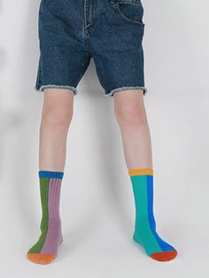 Make a bold statement with our Color Block Asymmetrical Cotton Socks. Featuring a dynamic design of contrasting colors and asymmetrical patterns, these socks add an edgy twist to your outfit. Crafted from soft and breathable cotton, they provide comfort and style all day long. Whether you're pairing them with sneakers for a casual look or dressing up with boots for a night out, these socks are sure to turn heads. Step into fashion-forward style with our Color Block Asymmetrical Cotton Socks! You Trendy Multicolor Socks For Spring, Trendy Blue Socks For Spring, Trendy Blue Socks For Winter, Trendy Blue Winter Socks, Trendy Stretch Blue Socks, Playful Blue Cotton Socks, Retro Multicolor Cotton Socks, Trendy Blue Knee-high Socks For Winter, Casual Blue Knee-high Socks For Spring