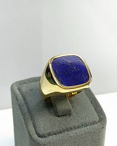 Lapis Lazuli Men Ring, Pinky Signet Blue Ring, Square Shape, Genuine Gemstone, Stylish Gold Silver Ring, Handmade Jewelry, Best Gift for Him ◎ Details ◎ ○ Material 14K Solid Gold or 925 Sterling Silver Weight of Ring : approx 18.00 gr Height of Ring : approx 5.30 mm ○ Upgrade to Solid 18K Gold, please click the link below: https://www.etsy.com/listing/962826004 ○ Gemstone Natural Lapis Lazuli Gemstone approx. 15 mm x 15 mm 4.50 ct Made to Order HANDMADE ITEM ○ For Men Collection : https://etsy.m Classic Blue Lapis Lazuli Rings, Classic Lapis Lazuli Ring With Polished Finish, Classic Lapis Lazuli Jewelry Ring, Luxury Lapis Lazuli Rings, Sapphire 14k Gold Signet Ring Gift, 14k Gold Sapphire Signet Ring As Gift, Luxury 14k Gold Jewelry With Large Stone, Modern Blue Rings With Large Stone, Luxury Lapis Lazuli Gemstone Rings