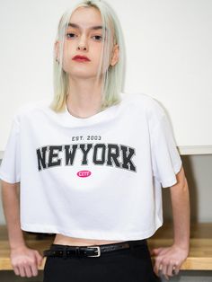 This is a comfortable and casual t-shirt that is made out of sturdy cotton and polyester blend fabric. With a minimal yet unique design of loose cropped silhouette and New York lettering print on the front chest, it gives a casual and trendy look. - Graphic print on the front chest- Ribbed neckline- Loose cropped silhouette- Round neckline White Cropped T-shirt With Logo Print For Spring, Spring White Cropped T-shirt With Logo, White Logo Print Cropped T-shirt, White Graphic Print Crew Neck Cropped T-shirt, White Graphic Print Cropped T-shirt With Crew Neck, White Cropped T-shirt With Slogan For Streetwear, Relaxed Fit Cropped T-shirt With Letter Print For Streetwear, Casual White Cropped T-shirt With Logo Print, White Cropped T-shirt With Text Print For Spring