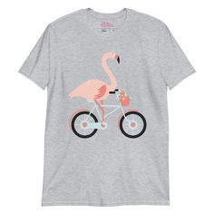 Let your flamingo spirit fly free! Any lover of the fabulous fowl is sure to enjoy this uniquely-designed flamingo t-shirt full of personality. With availability in a handful of colors, you can seamlessly combine the beautiful bird in with your outfits. Made from 100% ring-spun cotton, this unique piece of flamingo merch is meant for casual living - its light and soft features are great for lounging around the house on a lazy Sunday, taking a leisurely stroll through the neighborhood, or running Casual Pink T-shirt With Flamingo Print, Casual Pink Flamingo Print T-shirt, Pink Flamingo Print T-shirt For Summer, Pink Short Sleeve T-shirt With Flamingo Print, Pink Flamingo Print Short Sleeve T-shirt, Casual Summer T-shirt With Flamingo Print, Casual T-shirt With Flamingo Print For Summer, Casual Flamingo Print T-shirt For Summer, Fly Free