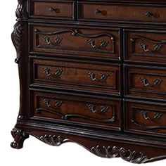 a large wooden dresser with many drawers and drawers on it's sides, in dark wood