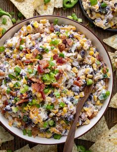 a bowl full of mexican salad with tortilla chips