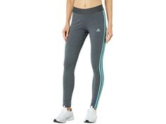 adidas 3-Stripes Leggings - Women's Clothing : Dark Grey Heather/Mint Ton : The comfortable tight fitting silhouette of the adidas 3-Stripes Leggings feature an elasticized waistline, ankle cut, and hip trefoil logo. adidas partners with Better Cotton Initiative (BCI) to improve cotton farming globally. 93% cotton, 7% spandex. Machine wash warm, tumble dry low. Imported. Measurements: Waist Measurement: 26 in Outseam: 35 in Inseam: 28 in Front Rise: 9 1 2 in Back Rise: 12 1 2 in Leg Opening: 10 Adidas Cotton Activewear, Adidas Cotton Sporty Activewear, Sportswear Cotton Activewear With Three Stripes Branding, Cotton Sportswear With Three Stripes Branding, Adidas Cotton Activewear For Sports, Cotton Sports Bottoms With Three Stripes Branding, Adidas Activewear With Athletic Fit And Three Stripes Branding, Adidas Cotton Activewear, Athletic Fit, Fitted Sportswear Bottoms With Adidas Logo