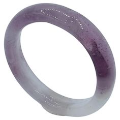 Introducing our Genuine Icy Lavender Serpentine Jade Ring, a mesmerizing piece that celebrates the unique beauty and metaphysical properties of Serpentine Jade. Crafted entirely from this exceptional gemstone, this ring showcases a harmonious blend of white and translucent lavender, creating an enchanting visual display. Serpentine Jade, also known as New Jade or Xiuyan Jade, is a captivating mineral renowned for its vibrant colors, unique patterns, and metaphysical significance. This gemstone h Visual Display, Jade Ring, Unique Beauty, Everyday Accessories, Delicate Rings, Vintage Bracelets, Exquisite Design, Unique Patterns, Band Rings