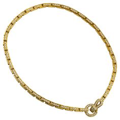 Brand: Cartier Collection: Agrafe Style: Pendant Necklace Metal: Yellow Gold Metal Purity :18K Stones: Round Brilliant Cut Necklace Length: 15.5 inches Pendant Size: 1 inch Total Item Weight(Grams): 55.8 Hallmark: Cartier; 18k; Serial # Includes: 24 Month Brilliance Jewels Warranty Brilliance Jewels Packaging Luxury Gold Diamond Necklace By Cartier, Luxury Cartier Fine Jewelry Necklaces, Classic Cartier Luxury Necklace, Classic Yellow Gold Luxury Necklace, Golden Necklaces, Pave Necklace, Golden Necklace, Round Necklace, Necklace Pendants