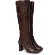 Meet Saint Emily, the new classic. Set the trend this season in these croco embossed vegan leather knee high boots from SaintG, these boots are sure to turn heads. Featuring knee high shaft, wide calf, a pointed toeline and covered block mid high heels. Full nude color genuine leather lined for a luxurious feel, cushioned leather insole provides lasting comfort. The slip on closure boot sit on a tunit sole. Brand Name - Saint G Upper - Vegan Leather Lining - Full Leather Insole - Leather Sole - Brown Knee-high Heeled Boots With Leather Lining, Brown Knee-high Calf Leather Heeled Boots, Brown Faux Leather Knee-high Boots With Block Heel, Luxury Brown Calf Leather Knee-high Boots, Luxury Brown Knee-high Boots With Reinforced Heel, Leather Knee High Boots, Vegan Leather Boots, Knee High Leather Boots, Sheep Leather