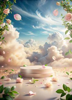 a white box sitting on top of a table surrounded by flowers and leaves in the sky