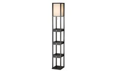 a tall black shelf lamp with a white light in the center and two shelves below it