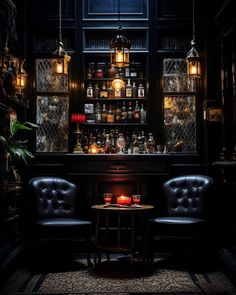 two leather chairs sitting next to each other in front of a bar