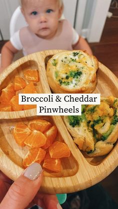 broccoli and cheddar pinwheels in a wooden bowl on a plate